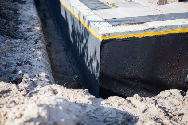 Professional Waterproofing technician working in Odenton, MD